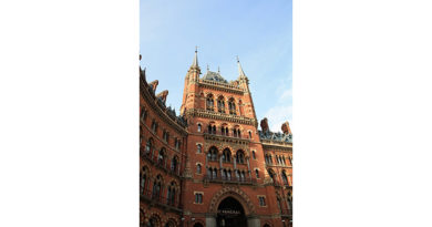 A Rough Start To The Final Quarter Of 2019 For UK Hotels - A large brick building with St Pancras railway station in the background - Photography